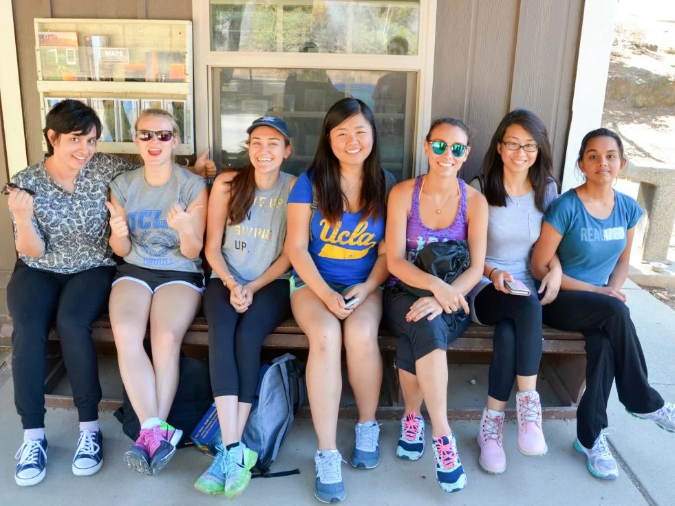 Some of the ladies of the Bitan Lab sit on a bench during a group outing.