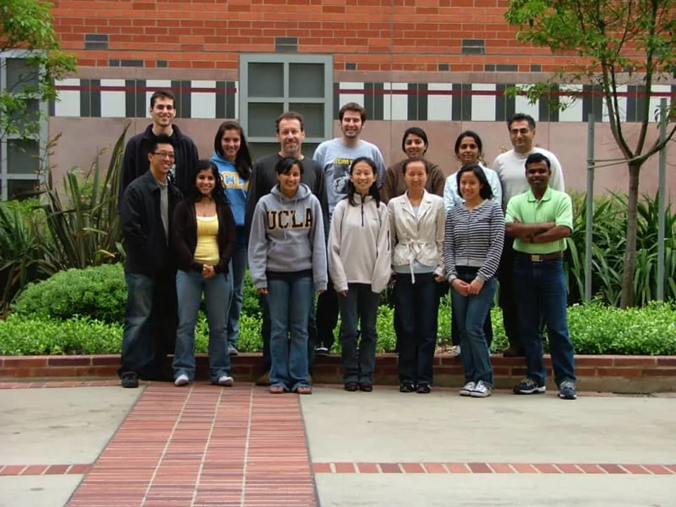 Bitan Lab student researchers pose for a photo outdoors.