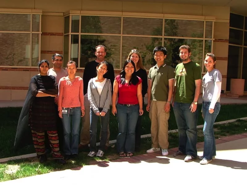 Bitan Lab student researchers pose for a photo outdoors.